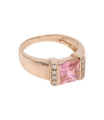 Rose gold ring with a square pink gemstone flanked by small diamonds on the sides; classic engagement-style design