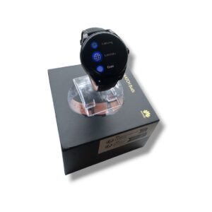 Smartwatch with round black face displayed on a transparent stand atop a black retail box, Huawei logo visible on the box edge:** product photo