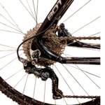 Rear bicycle derailleur and cassette with chain on a black aluminum frame; drivetrain dirty from use.