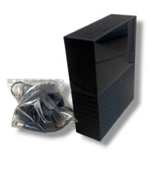 Black external hard drive enclosure with a coiled power adapter in a clear plastic bag beside it.