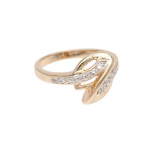 Gold ring with a twisted design set with small diamonds along the band