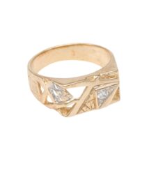 Gold ring with angular geometric motifs and small diamond accents