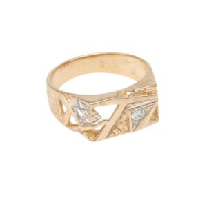 Gold ring with angular geometric motifs and small diamond accents
