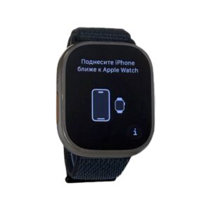 Apple Watch during setup showing a pairing instruction to bring the iPhone close to the watch, with phone and watch icons on screen.