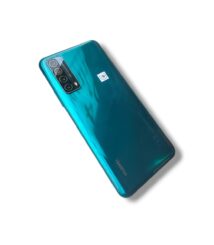 Teal Huawei smartphone seen from the back, displaying a quad-camera module in the top-left corner and a glossy gradient finish.