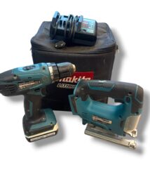 Cordless drill, reciprocating saw, and charger with a black Makita tool case and battery pack (Makita lithium).