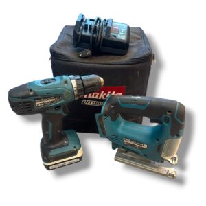 Cordless drill, reciprocating saw, and charger with a black Makita tool case and battery pack (Makita lithium).