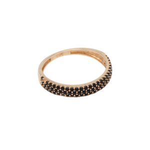 Gold ring with a row of black pavé stones along the top edge