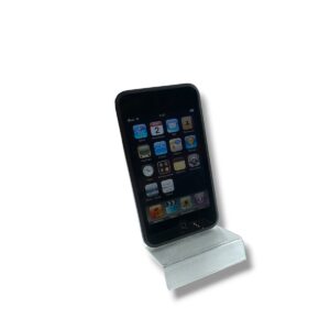 Black iPhone resting on a small silver metal stand, angled for display on a table.