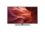 Flat-screen television on a slim metal stand displaying a red canyon wallpaper.