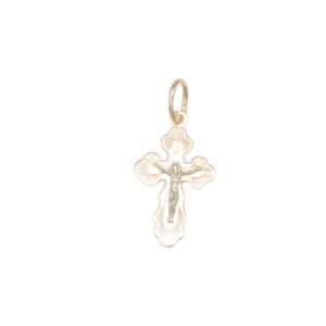 Gold cross pendant with a raised crucifix Jesus figure on a decorative ornate cross