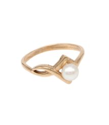 Gold ring with a small white pearl in a curved centerpiece design on a pale background.