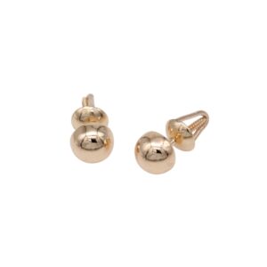 Gold-tone spherical cufflinks with polished, shiny balls on a white background.