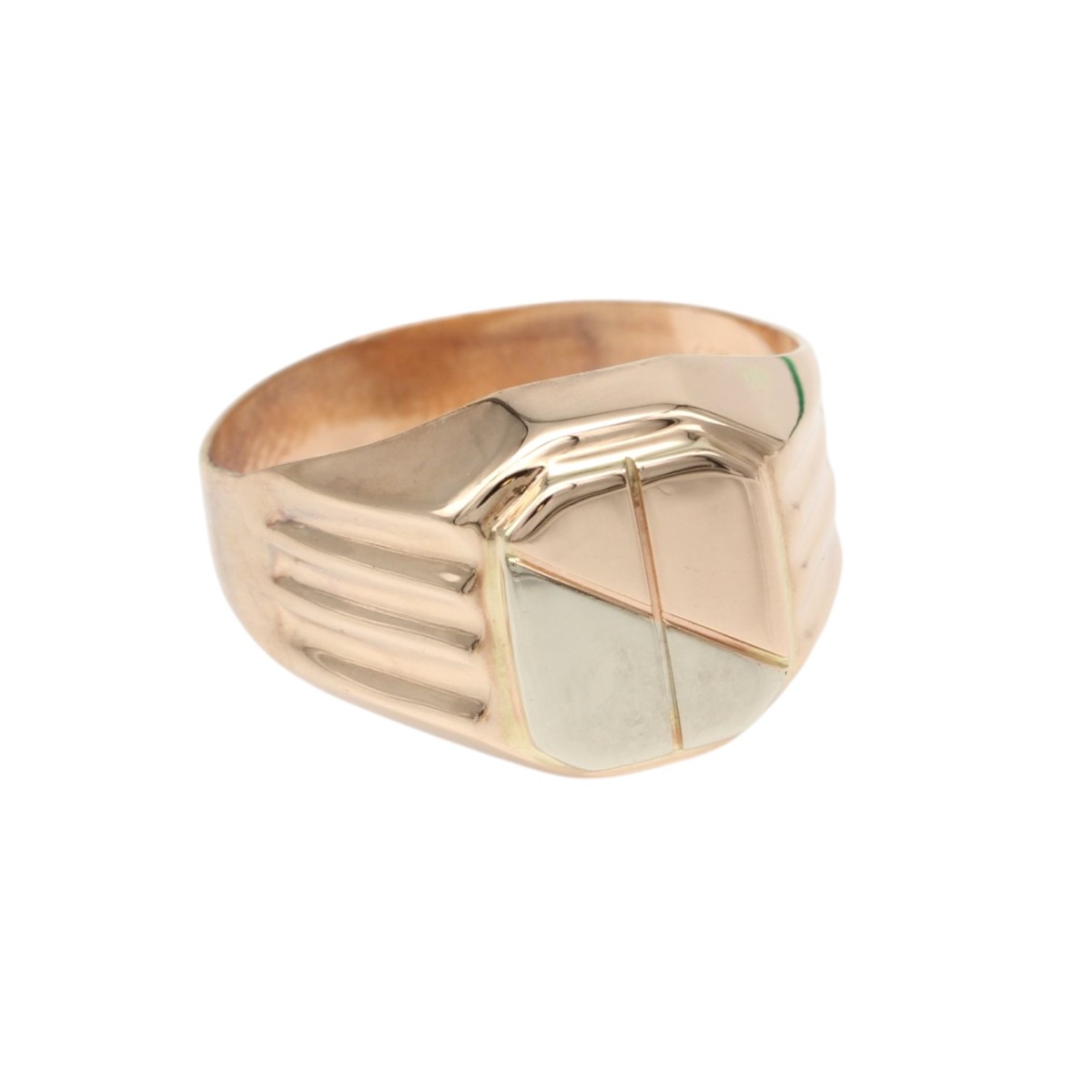 cdd52a506e09b454800a4978b50d296ejpg - Mezola OÜ Gold signet ring with a geometric, faceted face in silver-toned panels on a warm band.