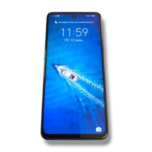 Lock screen on a smartphone showing time 11:59 and date, with a speedboat moving through blue water wallpaper