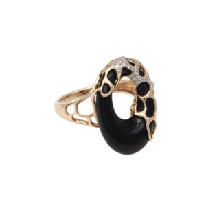 Gold-tone ring with a large black onyx centerpiece and diamond-studded lattice detailing.