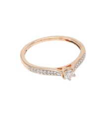 Rose gold ring with a central diamond in a prong setting and pavé diamonds along the band.