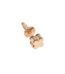 Gold-colored flower-shaped earring back (stud post) close-up, showing screw-style fitting