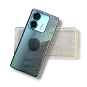 Blue smartphone with two-camera module and a circular pop socket on its back, displayed with a clear case behind.