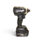 Cordless Makita drill/impact driver with 18V battery attached, shown in side view
