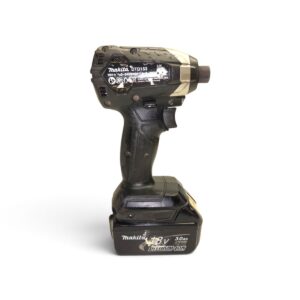 Cordless Makita drill/impact driver with 18V battery attached, shown in side view