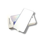 Samsung Galaxy A36 5G smartphone resting on its box with a blank white screen visible.