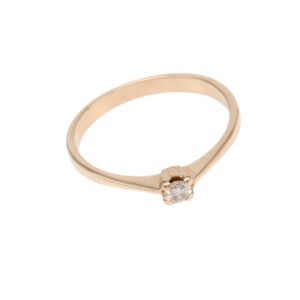 Gold ring with a single round diamond solitaire set in a prong setting on a slim band (engagement ring).