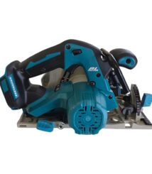 Cordless circular saw with teal body and black handle on a metal base plate ready to cut redwood.