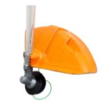 Orange safety helmet mounted on a vertical metal pole with a black caster wheel and a green cord at the base, part of a tool/rig setup.