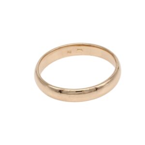 Gold wedding band with a smooth, polished surface