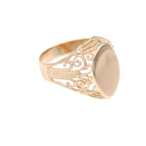 Rose gold ring with intricate filigree lattice and a large smooth oval bezel setting