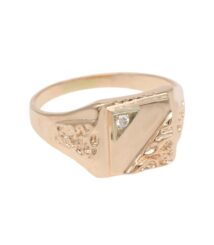 Gold signet ring with a triangular motif and small diamond accent on the bezel, elegant and vintage-inspired.