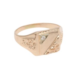 Gold signet ring with a triangular motif and small diamond accent on the bezel, elegant and vintage-inspired.