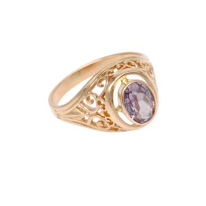 Elegant rose-gold ring with an oval lavender gemstone and intricate filigree band centerpiece.