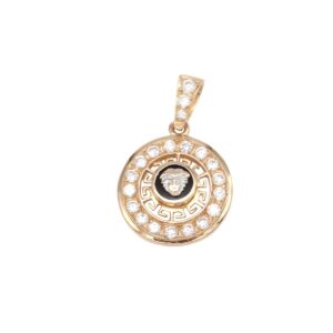 Gold circular pendant with outer ring of diamonds and an inner Greek key pattern surrounding a black center featuring a silver Medusa head.