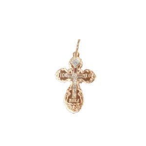 Gold cross pendant with ornate border, a small diamond at the top and a loop for a chain.