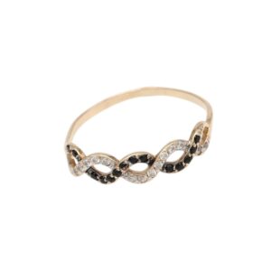 Gold ring featuring two intertwined loops encrusted with alternating black and clear stones on a polished band