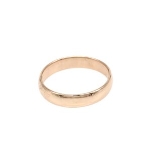Plain gold wedding band with a smooth, polished finish