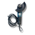 Corded Makita angle grinder with a circular grinding wheel guard and a long power cord still attached to the plug.
