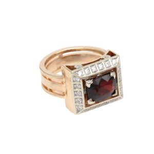 Rose gold ring with a square red gemstone framed by a pave diamond square setting