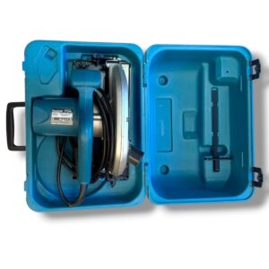 Open blue plastic carrying case with a Makita circular saw and coiled power cord inside