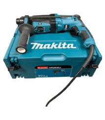 Makita HR2630J hammer drill placed on its teal carrying case with cord extending from the tool