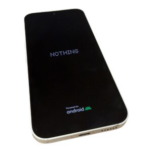 Smartphone with a black screen showing the word NOTHING and an Android logo at the bottom.