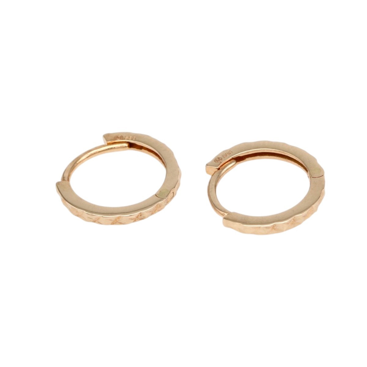 b5339b20f13a23a7d6b25baa3891c0ffjpg - Mezola OÜ Pair of small gold hoop earrings with a textured, faceted band on a white background