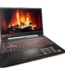ASUS TUF gaming laptop with a flames wallpaper on the screen, angled open view.