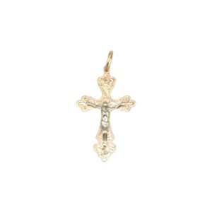 Ornate gold cross pendant with a silver crucified figure at the center.