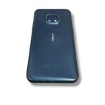 Blue Nokia smartphone back with a square camera module at the top center and branding visible on the back panel