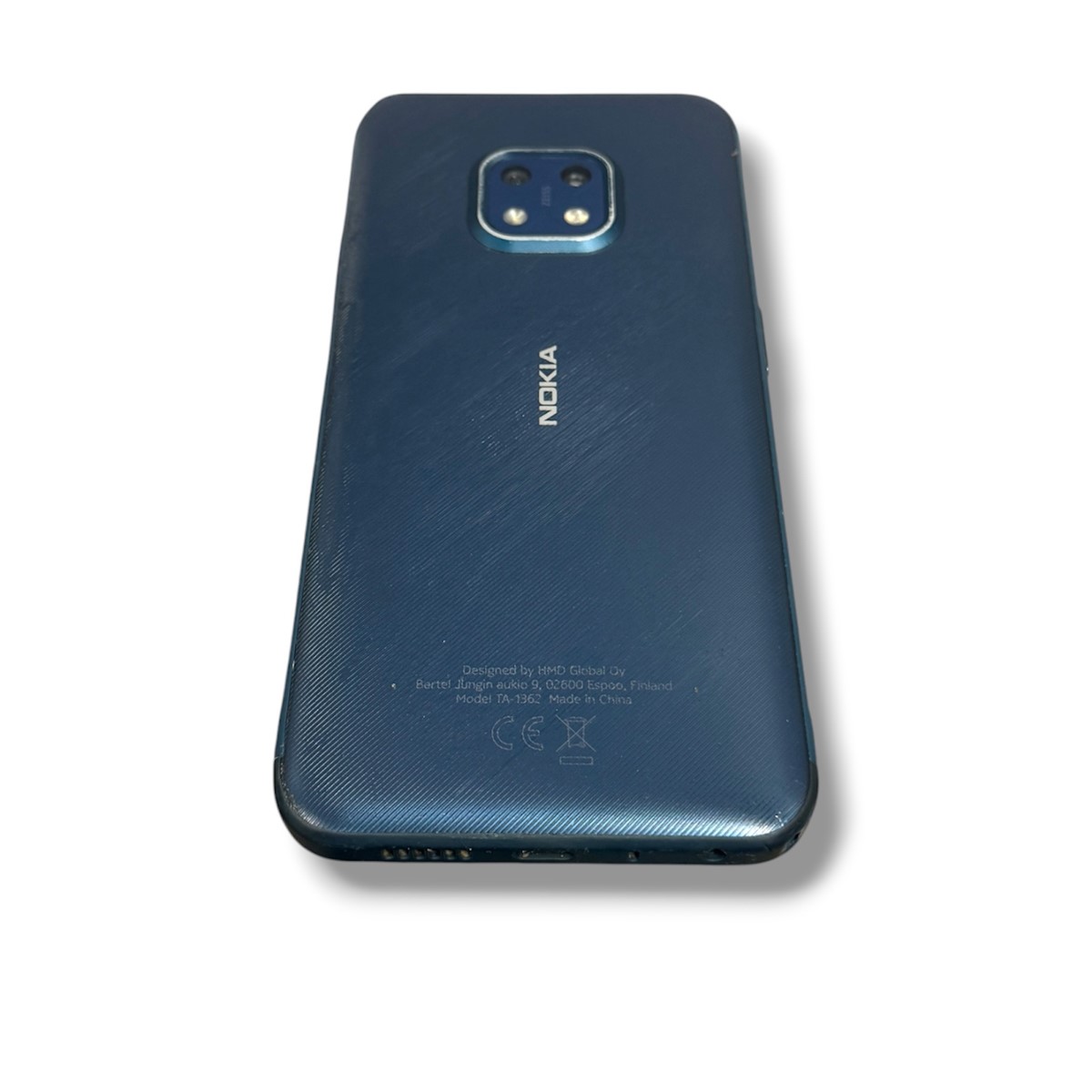cd4c7bacc57b2bbfa4bc93cea9803a34jpg - Mezola OÜ Blue Nokia smartphone back with a square camera module at the top center and branding visible on the back panel