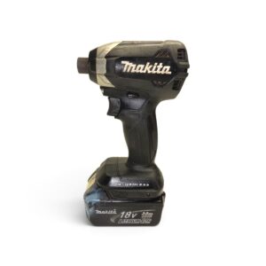 Makita 18V cordless drill with battery attached, viewed from the side on a white background, angled to show the chuck and grip