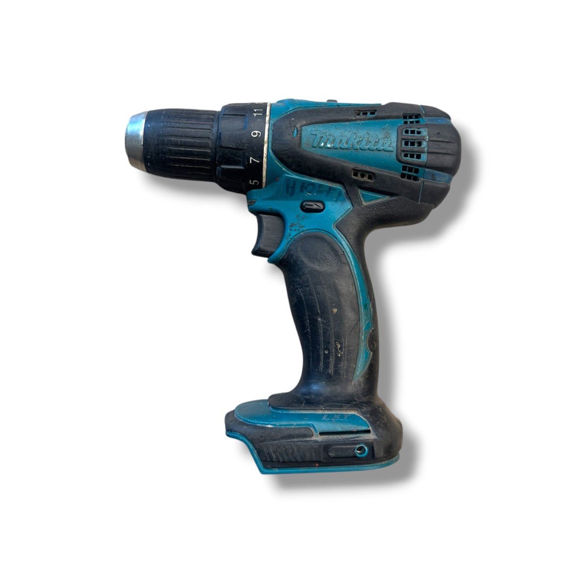 e345951a1e44baf1b240a509543f5b89jpg - Mezola OÜ Cordless drill/driver with teal and black body, Makita branding, shown from the side on a white background
